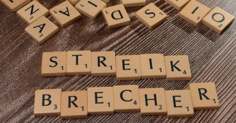 Conflict Resolution - Scrabble tiles with the word streik brecher