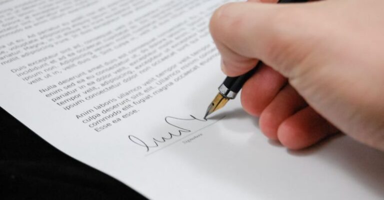 Documents - Person Signing in Documentation Paper