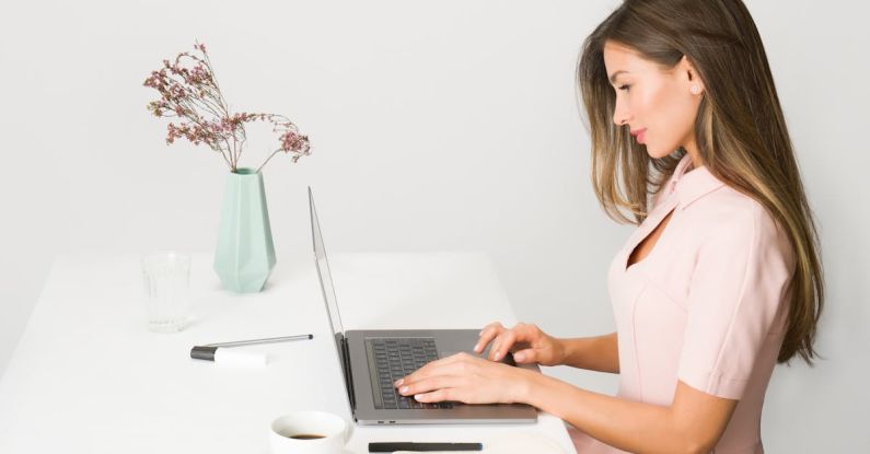 Standing Desk - Woman in Pink Dress Using Laptop Computer
